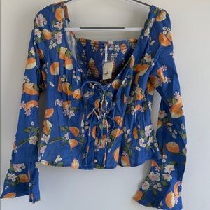 Free People Kayla Pintuck Top Orange Lemon Citrus Fruit Print NWT sz M